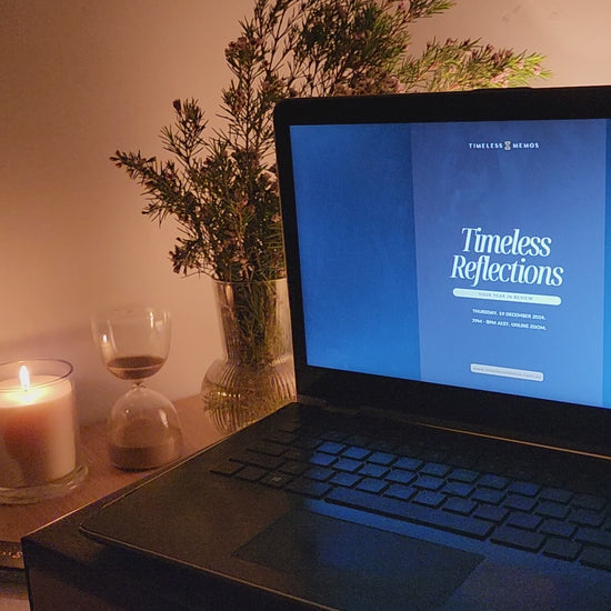 laptop, candle, hour glass.